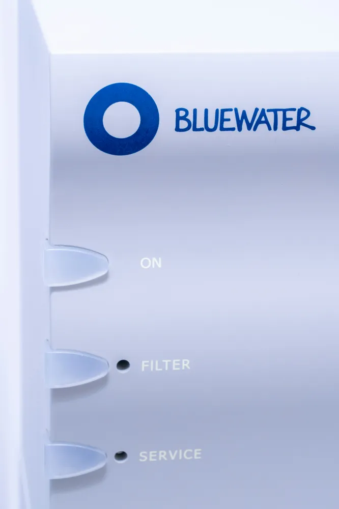 Clean water flowing from completed borehole